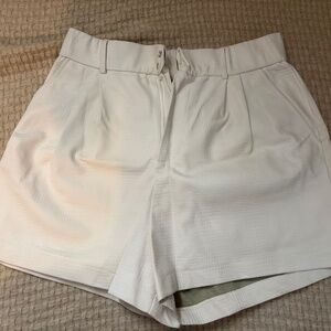 white faux leather shorts